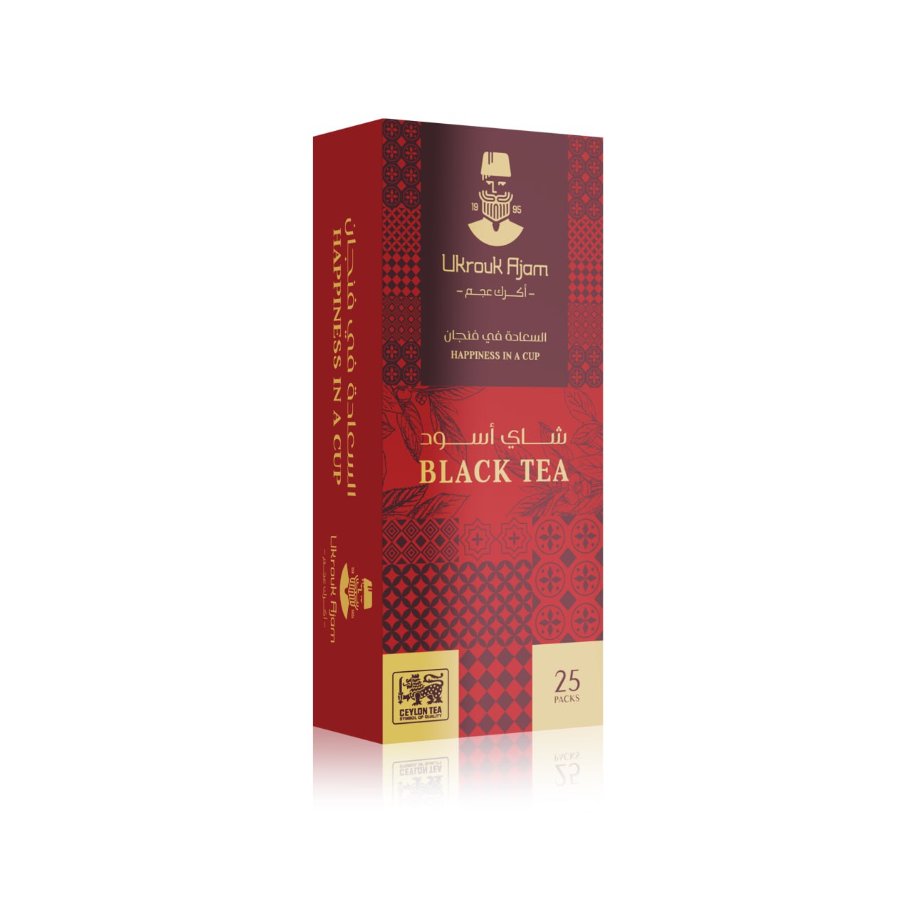 Ukrouk Ajam Black Tea in an elegant red box of 25 packs, detailed with traditional motifs and Arabic script, offering a premium Ceylon tea experience.