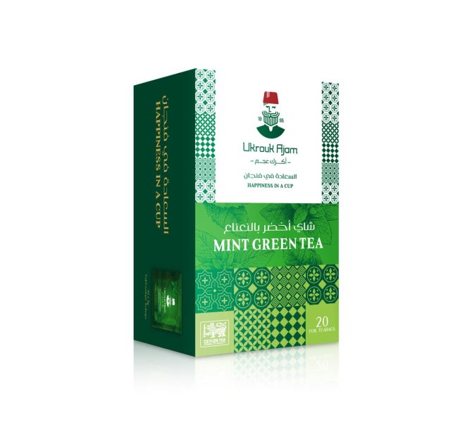 Ukrouk Ajam Mint Green Tea box of 20 foil teabags with Ceylon tea, showcasing vibrant green packaging with Arabic and English text, 'Happiness in a Cup' slogan.